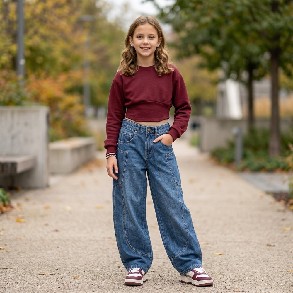 Jeans da bambina largo fit banana con tascone 